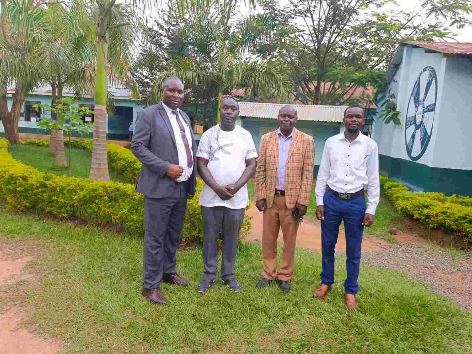 Mwibale Senior School management team group photo in the school compound